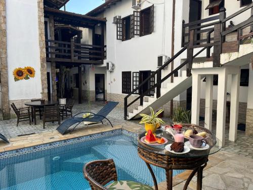 Bazén v ubytování Pousada Villa Real Paraty - Localização e café da manhã EXCELENTES" nebo v jeho okolí