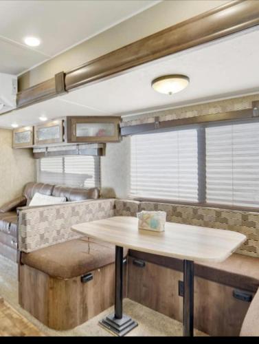 a dining area in an rv with a table at Key Largo Paradise in Key Largo