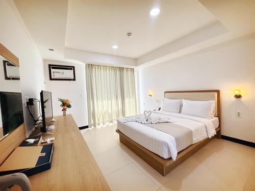 TV a/nebo společenská místnost v ubytování 라메디 리조트 보홀 Ramede Resort Bohl