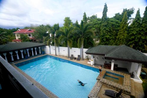 an overhead view of a swimming pool on a building at Hotel Gabriella in Tagbilaran City