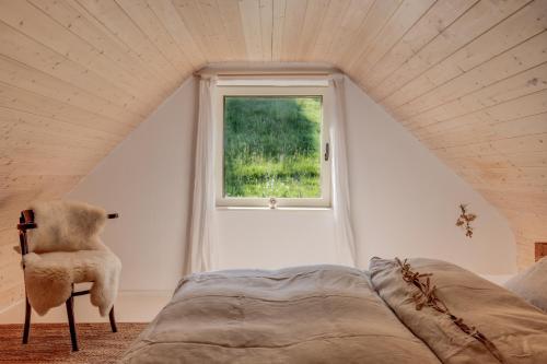 Ένα ή περισσότερα κρεβάτια σε δωμάτιο στο chalupa Hajan