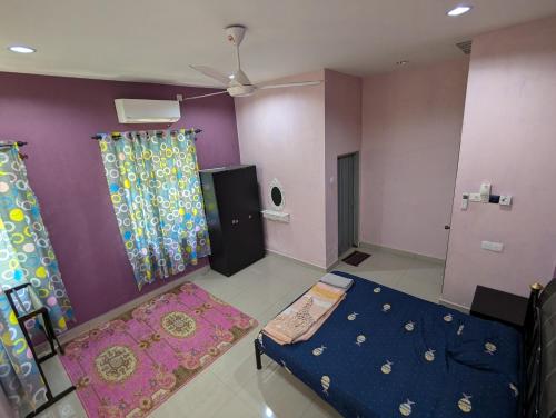 Katil atau katil-katil dalam bilik di Aish Homestay