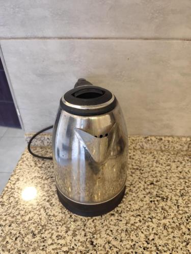 a toaster sitting on top of a counter at Gentle Breeze Studio 3 in Amman