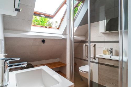 Koupelna v ubytování La Timonerie - Appt climatisé à Bénodet vue mer