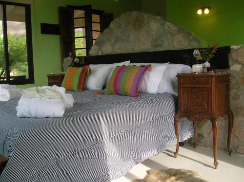 Кровать или кровати в номере Apart Los Antiguos