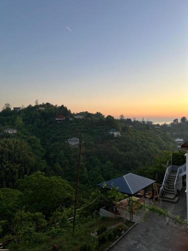 a view of a sunset from a house at Гостевой дом Руслан in Batumi