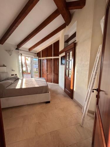 a bedroom with a bed and a window at Sea View in Pieve Ligure