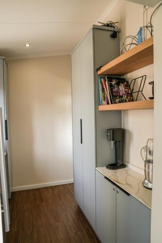 Η κουζίνα ή μικρή κουζίνα στο Upmarket modern beautiful home