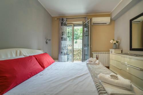 Postel nebo postele na pokoji v ubytování Casa Mata e Grifone - Bivani con posto auto