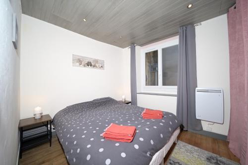 Postel nebo postele na pokoji v ubytování Le Gîte des 3000 avec Spa