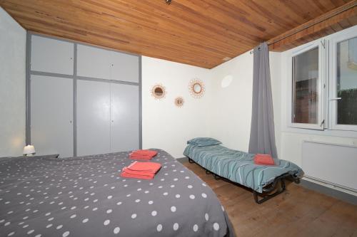 Postel nebo postele na pokoji v ubytování Le Gîte des 3000 avec Spa