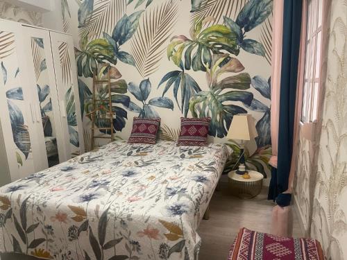 En eller flere senge i et værelse på Apartamento Arte Malaga