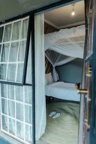 Letto o letti in una camera di Kutoka Lodge