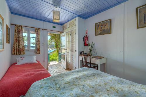 Ένα ή περισσότερα κρεβάτια σε δωμάτιο στο Paradise in Portugal