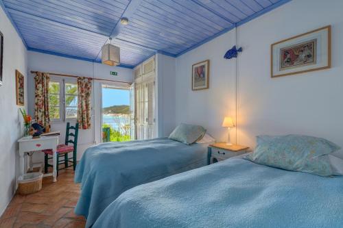 Ένα ή περισσότερα κρεβάτια σε δωμάτιο στο Paradise in Portugal