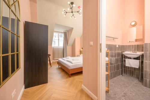 Cama o camas de una habitación en Palais Palffy Suits