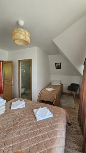 Postel nebo postele na pokoji v ubytování Casă de vacanță Chalet le Cristal