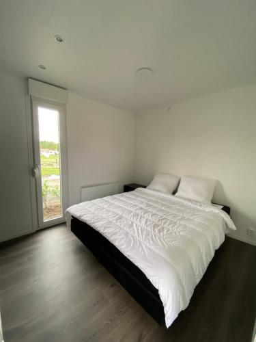Postel nebo postele na pokoji v ubytování Vakantiepark Lemmer