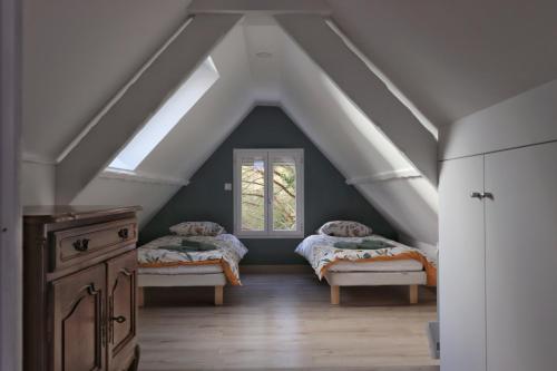 Postel nebo postele na pokoji v ubytování Gite d'ALTONA