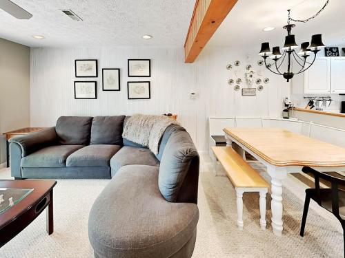 a living room with a couch and a table at Deep Creek Village #33 in McHenry