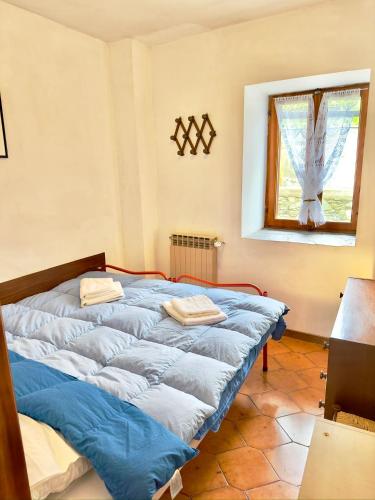 Katil atau katil-katil dalam bilik di Chalet con Vista Mozzafiato
