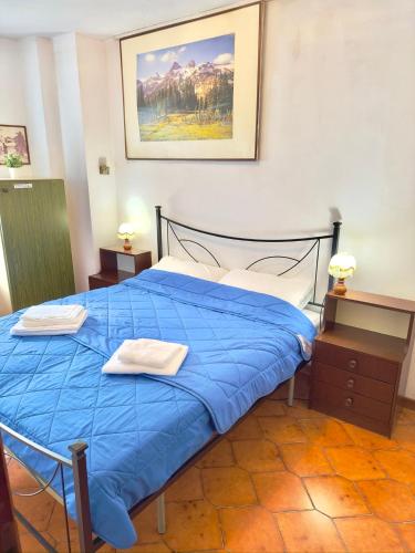 Katil atau katil-katil dalam bilik di Chalet con Vista Mozzafiato