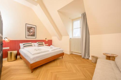 Cama o camas de una habitación en Palais Palffy Suits