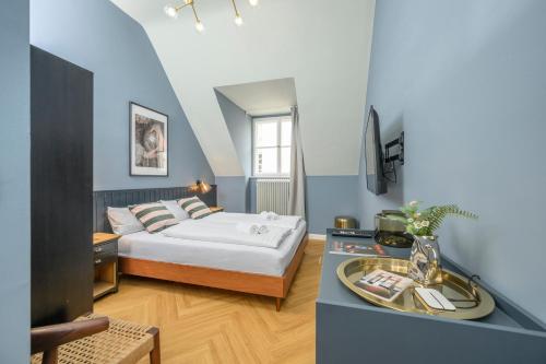 Posteľ alebo postele v izbe v ubytovaní Palais Palffy Suits
