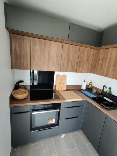 Photo de la galerie de l'établissement Appartement neuf près de la Défense Arena, à Nanterre