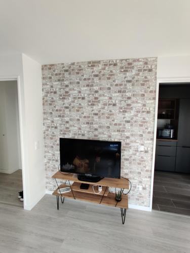 Appartement neuf près de la Défense Arena