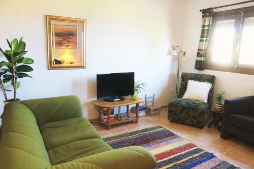 Μια τηλεόραση ή/και κέντρο ψυχαγωγίας στο Apartamento en Bérchules