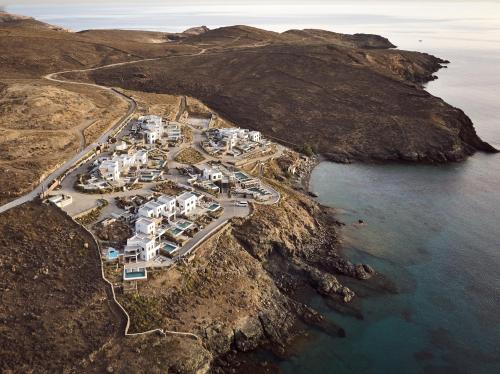 an aerial view of a marina on a rocky island at Semeli Coast Mykonos Curio Collection by Hilton in Merchia Beach