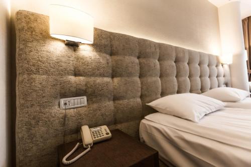 Katil atau katil-katil dalam bilik di Grand Hotel Belvedere