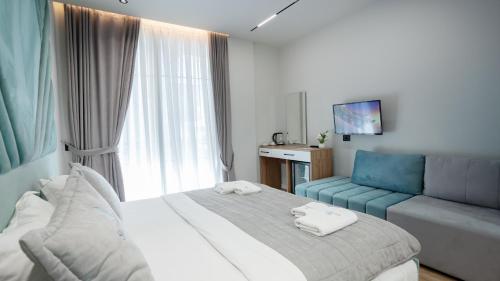 Postel nebo postele na pokoji v ubytování Hotel Saly