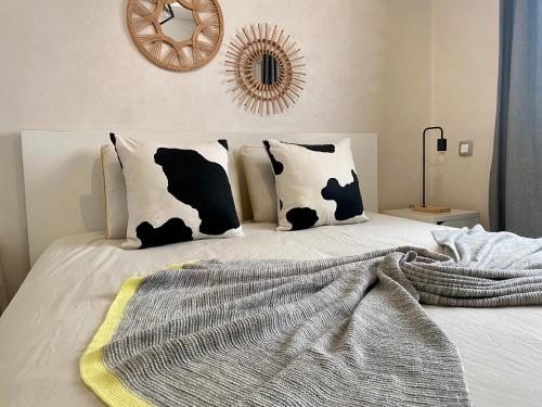 Ένα ή περισσότερα κρεβάτια σε δωμάτιο στο Appartement près de Novotel face au parc WELCOME STAY