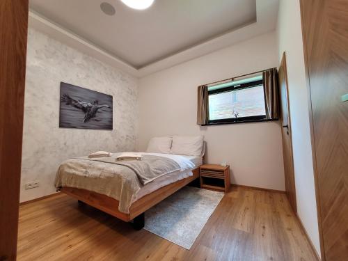 Ένα ή περισσότερα κρεβάτια σε δωμάτιο στο Apartmán SPA - Chalet ONE Jasná