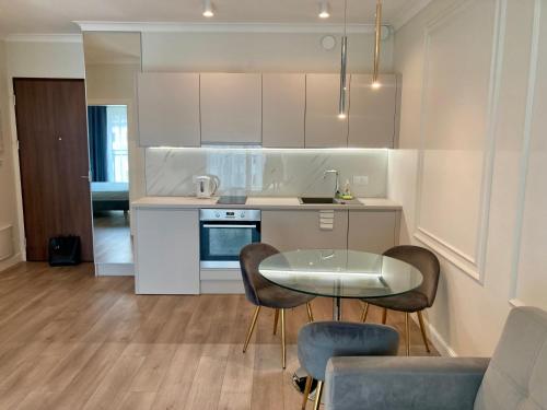 Køkken eller tekøkken på Mennica Residence de luxe Waliców 11