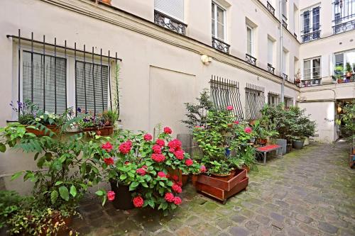 Appart Faubourg St Denis 4 personnes