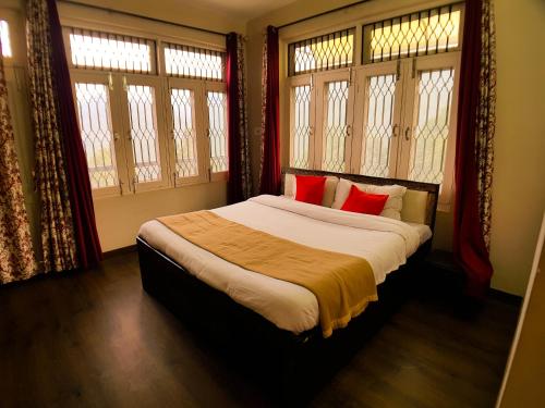 Postel nebo postele na pokoji v ubytování Hotel Cozy Nook