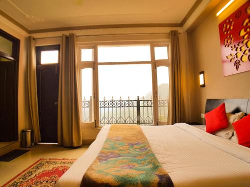 Postel nebo postele na pokoji v ubytování Hotel Cozy Nook