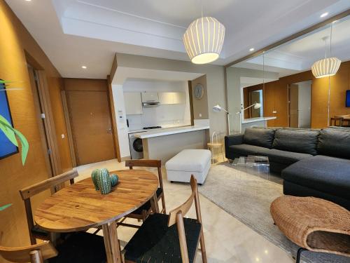 Posezení v ubytování Gardenia CFC by IB Signature - Cosy 1Bedroom Apt with Wifi, 24x7 Security, Parking, Self check-in, Large terrace, Walk to Cafes and Gym