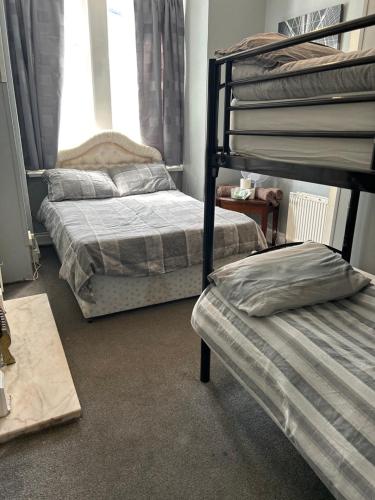 Ένα ή περισσότερα κρεβάτια σε δωμάτιο στο MyRoomz Golden Strand Hotel