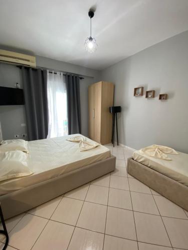 Vuode tai vuoteita majoituspaikassa Ar Apartment
