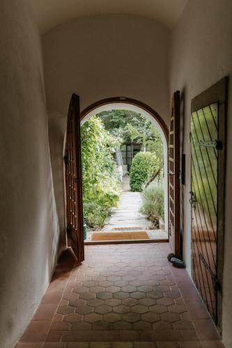 an entrance to a house with an open door at Penzion Telč No. 20 in Telč