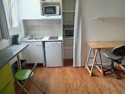 Photo de la galerie de l'établissement studio refait à neuf avec jardin partagé, à Amiens