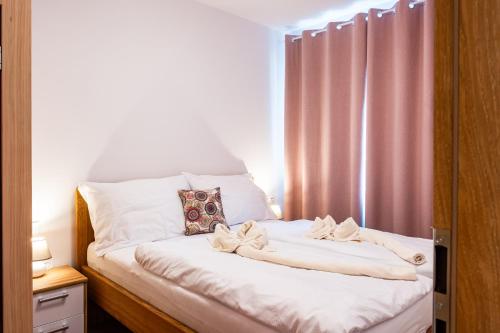 Postel nebo postele na pokoji v ubytování Mandala
