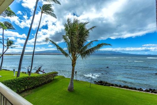 a view of the ocean from the balcony of a house at Maalaea Kai 220 in Wailuku