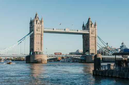 a suspension bridge over the water with at Club Quarters Hotel London City, London in London