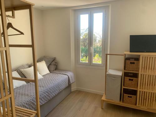 55m2 Charmante maison mitoyenne, jardin, parking