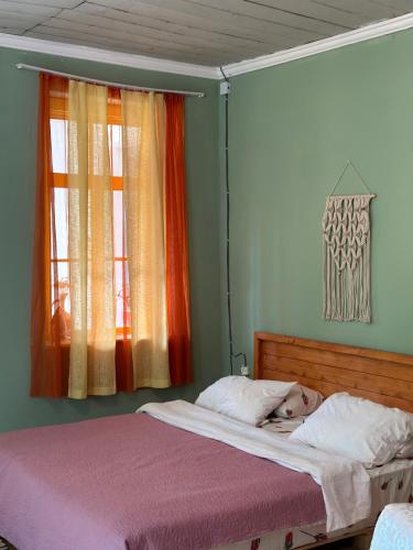 Llit o llits en una habitació de Ghebi Inn